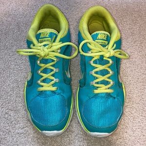 Blue and green Nike running shoes